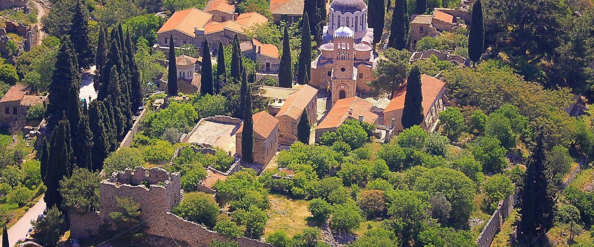 Aerial view of the Nea Moni monastery complex among cypress trees on Chios
