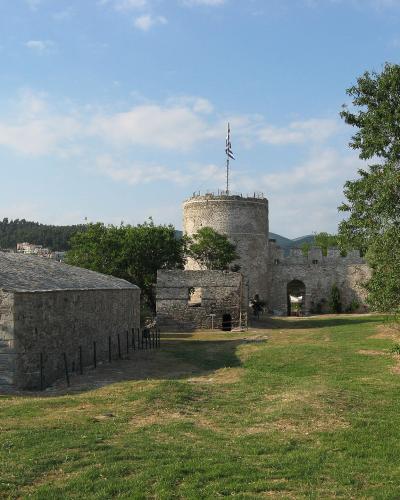 Round tower and stone buildings inside Kavala castle