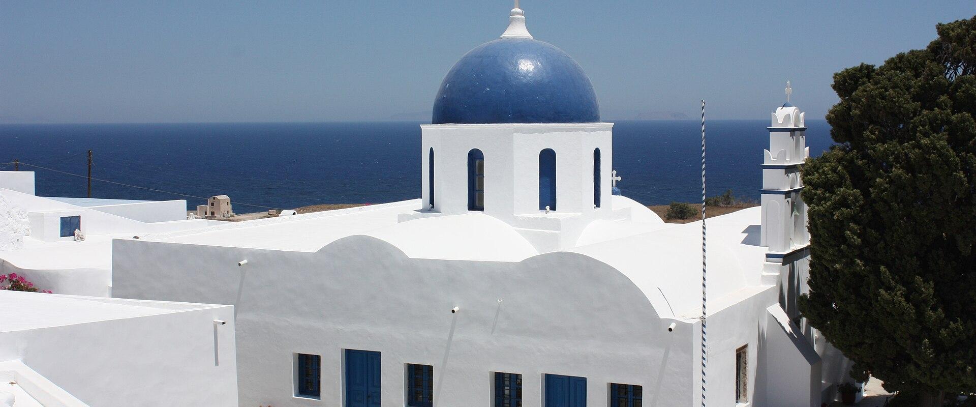 White Buildings With Blue-domed Churches