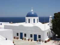 White Buildings With Blue-domed Churches