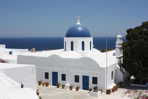 White Buildings With Blue-domed Churches