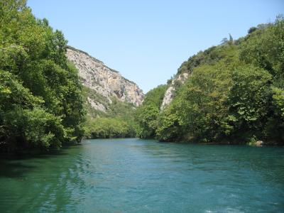 The Pineios River flowing through the green Vale of Tempe