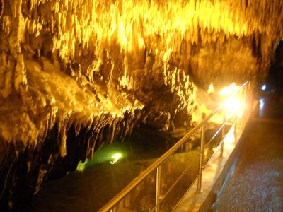 Illuminated stalactites and a railed walkway inside the Dragon's Cave (Spilaia tou Drakou) in Kastoria
