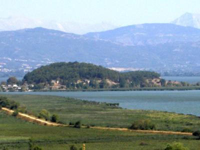 The Island of Ioannina in Lake Pamvotida with the mountains behind