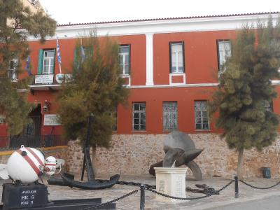 The red facade of the Maritime Museum of Crete in Chania