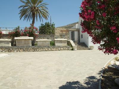 The courtyard of the Archaeological Museum of Paros with ancient sarcophagi